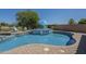 Inviting backyard pool featuring an attached spa and seating area perfect for outdoor enjoyment at 3414 E Virgil Dr, Gilbert, AZ 85298