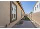 View of side yard and home's exterior at 3414 E Virgil Dr, Gilbert, AZ 85298
