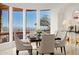 Formal dining room features stylish furniture, a large window with scenic views at 5802 E Cholla Ln, Paradise Valley, AZ 85253