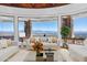 Cozy seating area with modern decor offers stunning views through expansive windows at 5802 E Cholla Ln, Paradise Valley, AZ 85253