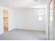 Bedroom with lots of natural light coming from the sliding glass door and a window at 2445 W Rowel Rd, Phoenix, AZ 85085