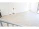 Bright and airy living space with a white door, staircase, light-colored wood flooring, and ample sunlight at 2445 W Rowel Rd, Phoenix, AZ 85085
