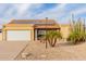 Inviting single-story home with a two-car garage, solar panels, and low-maintenance desert landscaping at 6908 W Sunnyside Dr, Peoria, AZ 85345