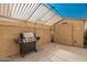 Outdoor patio area with built-in grill and covered structure at 6908 W Sunnyside Dr, Peoria, AZ 85345