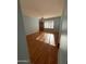 Sunlit dining room with shuttered windows and hardwood flooring at 10423 W Wheatridge Dr, Sun City, AZ 85373