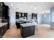 Spacious kitchen featuring a large island, dark cabinetry, and high-end finishes at 300 W Quartz Rock Rd, Phoenix, AZ 85085