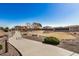 Neighborhood playground with play structures, shaded seating, and a walkway at 5411 W Grenadine Rd, Laveen, AZ 85339