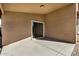 Covered patio with sliding glass door access at 5411 W Grenadine Rd, Laveen, AZ 85339