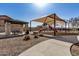 Community playground features a shaded play structure and picnic area at 5411 W Grenadine Rd, Laveen, AZ 85339