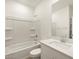 Bathroom featuring a shower-tub combo and a modern vanity at 3175 E Hayden Rose Ave, San Tan Valley, AZ 85143