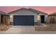 Charming single-Gathering home featuring a two-car garage and neutral colored exterior at 3175 E Hayden Rose Ave, San Tan Valley, AZ 85143