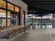 Charming patio seating area with modern design elements and views of common area at 3175 E Hayden Rose Ave, San Tan Valley, AZ 85143