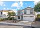 Charming two-story home with desert landscaping, a two-car garage and inviting front entry at 4691 E Torrey Pines Ln, Chandler, AZ 85249