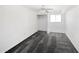 Bedroom showcasing carpet flooring, a ceiling fan, and a closet at 6938 E Flossmoor Ave, Mesa, AZ 85208