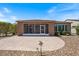 A covered patio with pavers offers a relaxed outdoor living space and seamless indoor-outdoor transition at 856 E Harmony Way, San Tan Valley, AZ 85140