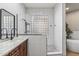 Spa-like bathroom featuring a soaking tub and walk-in shower at 10695 E Caribbean Ln, Scottsdale, AZ 85255