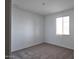 Spacious bedroom with neutral carpeting and large window at 37907 N Cowboy Ln, San Tan Valley, AZ 85140