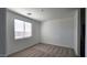 Bright bedroom with carpeted floor and window blinds at 37907 N Cowboy Ln, San Tan Valley, AZ 85140