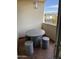 Private patio with round table and three concrete stools at 4330 N 5Th Ave # 106, Phoenix, AZ 85013