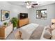 Comfortable main bedroom showcasing a soft color palette, natural light, and modern furnishings at 6556 S 258Th Dr, Buckeye, AZ 85326