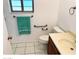 Clean bathroom with a toilet, sink, and shower at 10861 W Venturi Dr, Sun City, AZ 85351