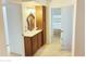 Home hallway with built-in storage and a vanity at 10861 W Venturi Dr, Sun City, AZ 85351