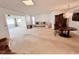 Open living and dining area with large windows at 10861 W Venturi Dr, Sun City, AZ 85351