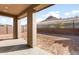 Covered patio with view of desert landscape and mountain at 13593 W Calle De Pompas --, Peoria, AZ 85383