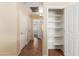 Hallway with linen closet and access to bedrooms at 2741 W Pecan Rd, Phoenix, AZ 85041