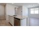 Modern kitchen with stainless steel appliances and granite countertop on island at 39980 W Bravo Dr, Maricopa, AZ 85138