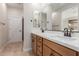 Bright bathroom features a double vanity with modern fixtures and ample counter space at 5664 N 205Th Ln, Buckeye, AZ 85396