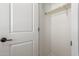 A simple bright empty closet space with a wooden closet rod at 5664 N 205Th Ln, Buckeye, AZ 85396