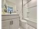 Clean bathroom with bathtub, shower, and vanity at 746 E Doral Ave # 201, Gilbert, AZ 85297
