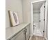 Bathroom with shower/tub combo and linen storage at 746 E Doral Ave # 201, Gilbert, AZ 85297