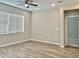 Spacious bedroom with large window and ceiling fan at 746 E Doral Ave # 201, Gilbert, AZ 85297
