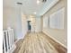 Spacious loft area with wood-look flooring and natural light at 746 E Doral Ave # 201, Gilbert, AZ 85297