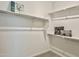 Large walk-in closet with ample shelving at 746 E Doral Ave # 201, Gilbert, AZ 85297