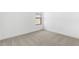 Simple bedroom with carpeted floor at 16555 N Lunar St, Maricopa, AZ 85138