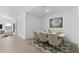 Contemporary dining room with seating for six people at 16555 N Lunar St, Maricopa, AZ 85138