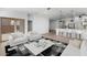 Bright living space with a view into the dining and kitchen areas, perfect for entertaining and daily living at 16555 N Lunar St, Maricopa, AZ 85138