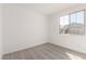 Bedroom with neutral carpet and a window view at 18440 W Monte Lindo Ln, Surprise, AZ 85387