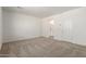 Bedroom with carpet flooring and en-suite bathroom at 18440 W Monte Lindo Ln, Surprise, AZ 85387