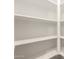 Walk-in pantry offers ample shelf space at 18440 W Monte Lindo Ln, Surprise, AZ 85387
