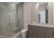 Modern bathroom features a glass shower, stylish vanity, and tiled walls, creating a spa-like retreat at 4414 N 29Th St, Phoenix, AZ 85016