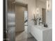 Elegant half-bathroom with marble countertop, modern fixtures, and neutral color scheme at 4414 N 29Th St, Phoenix, AZ 85016