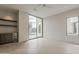 Open bedroom featuring a wet bar, wood floors, modern lighting, and a pool view at 4414 N 29Th St, Phoenix, AZ 85016