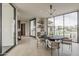 Bright dining room featuring a round table, modern lighting, and large windows at 4414 N 29Th St, Phoenix, AZ 85016