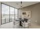 Dining area with natural light, modern chandelier, and sleek furniture set at 4414 N 29Th St, Phoenix, AZ 85016