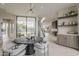 Dining area with modern decor, sleek black table, stylish lighting, and open floor plan at 4414 N 29Th St, Phoenix, AZ 85016