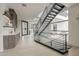 Bright entryway showcasing modern staircase, light wood floors, and open-concept design at 4414 N 29Th St, Phoenix, AZ 85016